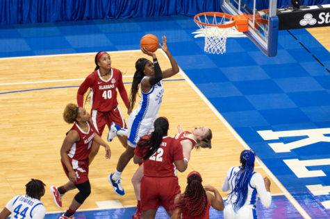 Kentucky Wildcats guard Rhyne Howard (10) charges a defender to put up a shot during the University of Kentucky vs. Alabama womens basketball game on Thursday, Jan. 28, 2021, at Rupp Arena in Lexington, Kentucky. Kentucky won 81-68. Photo by Jack Weaver | Staff
