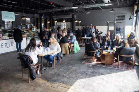 Customers are seated at tables at Old North Bar and Laura Lou Pâtisserie on Saturday, Feb. 20, 2021, at Greyline Station in Lexington, Kentucky. Photo by Jack Weaver | Staff