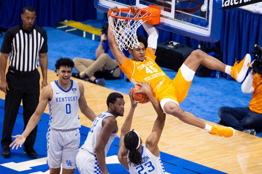Tennessee+Volunteers+guard+Keon+Johnson+%2845%29+hangs+on+the+rim+after+dunking+the+ball+during+the+University+of+Kentucky+vs.+Tennessee+mens+basketball+game+on+Saturday%2C+Feb.+6%2C+2021%2C+at+Rupp+Arena+in+Lexington%2C+Kentucky.+UK+lost+82-71.+Photo+by+Michael+Clubb+%7C+Staff