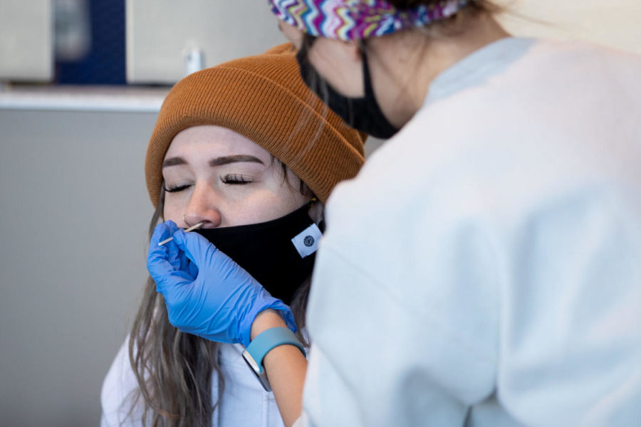 Jayden Riggs, a sophomore clinical management major, gets tested for COVID-19 on Friday, Feb. 5, 2021, at K-Lair in Haggin Hall in Lexington, Kentucky. Photo by Michael Clubb | Staff