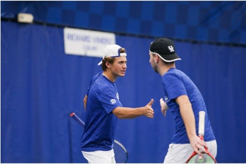 Liam Draxl high-fives a teammate during Kentucky match with Dayton.IMAGE OBTAINED FROM UK ATHLETICS.