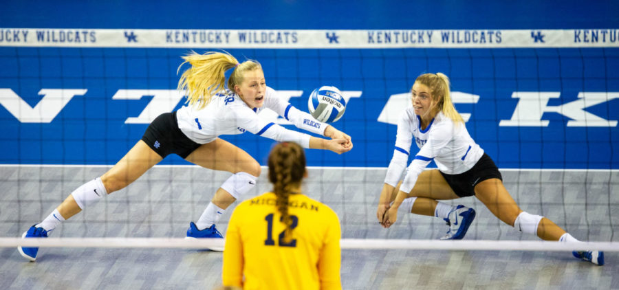 Kentucky sophomores Alli Stumler and Lauren Tharp dive for a ball during the second round game of the DI NCAA Volleyball Tournament against Michigan on Saturday, Dec. 7, 2019, at Memorial Coliseum in Lexington, Kentucky. Kentucky won 3-0. Photo by Jordan Prather | Staff