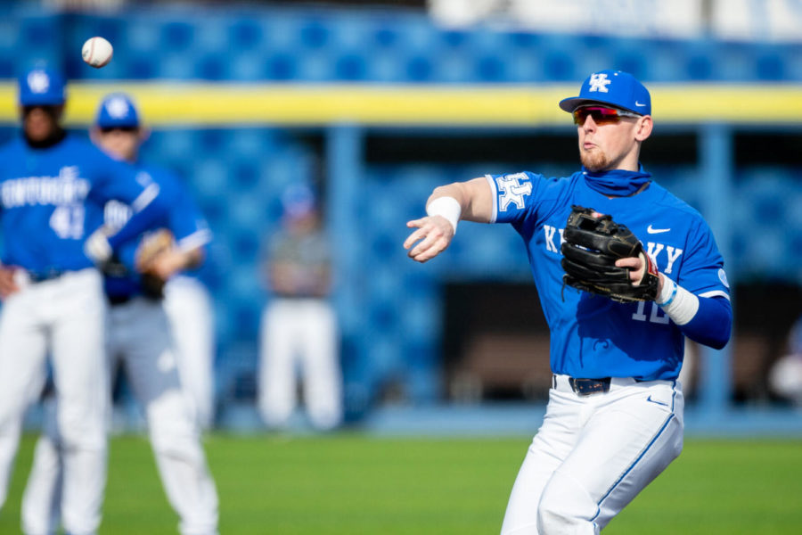 Kentucky Wildcat Chase Estep (12) throws a baseball during warmups before the UK vs. Western Kentucky University baseball game on Tuesday, March 9, 2021, at Kentucky Proud Park in Lexington, Kentucky. UK won 6-5. Photo by Michael Clubb | Staff