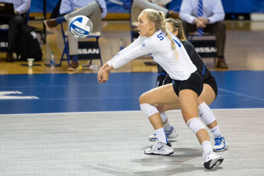 Kentucky Wildcats outside hitter Alli Stumler (17) sets the ball during the UK vs. Louisiana State University game on Friday, March 5, 2021, at Memorial Coliseum in Lexington, Kentucky. UK won 3-0. Photo by Jack Weaver | Staff