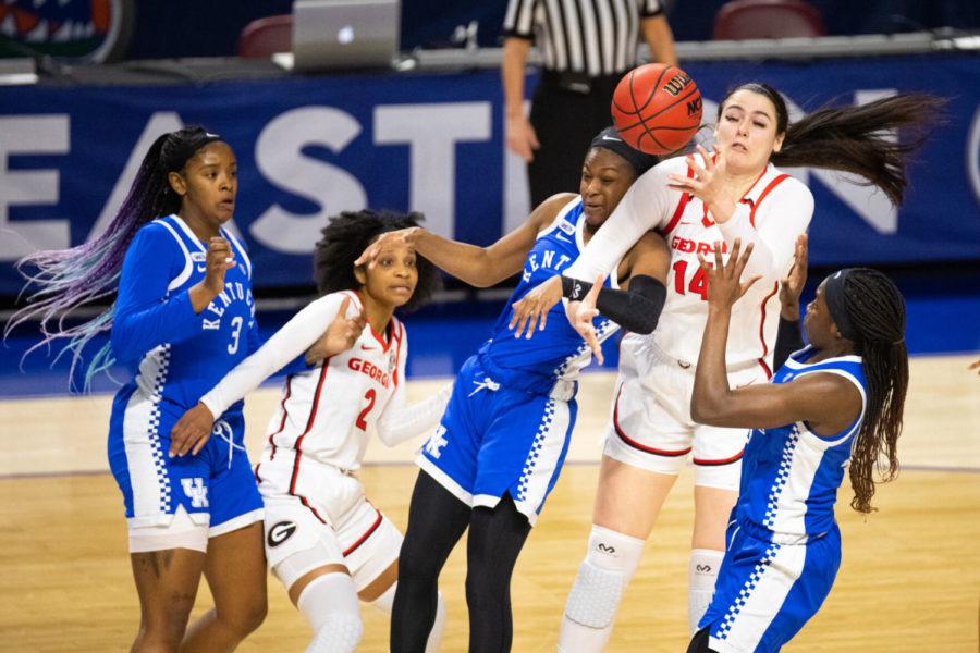 Kentucky Wildcats guard Robyn Benton (1) gets tangled up with UGA during the UK vs. Georgia women’s SEC Tournament basketball game on Friday, March 5, 2021, at Bon Secours Wellness Arena in Greenville, South Carolina. UK lost 78-66. Photo by Michael Clubb | Staff