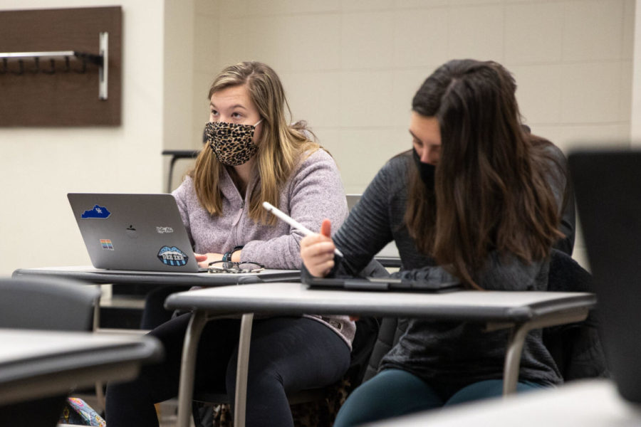 Students take notes in Jill Day’s History & Philosophy of Physical Education & Sport class on Friday, Feb. 5, 2021, at White Hall Classroom Building in Lexington, Kentucky. Photo by Jack Weaver | Staff