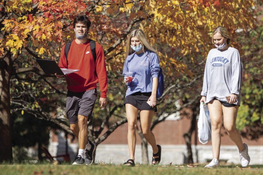 A group of UK students walks in front of White Hall Classroom Building on Thursday, Oct. 22, 2020, at the University of Kentucky in Lexington, Kentucky. Photo by Jack Weaver | Staff