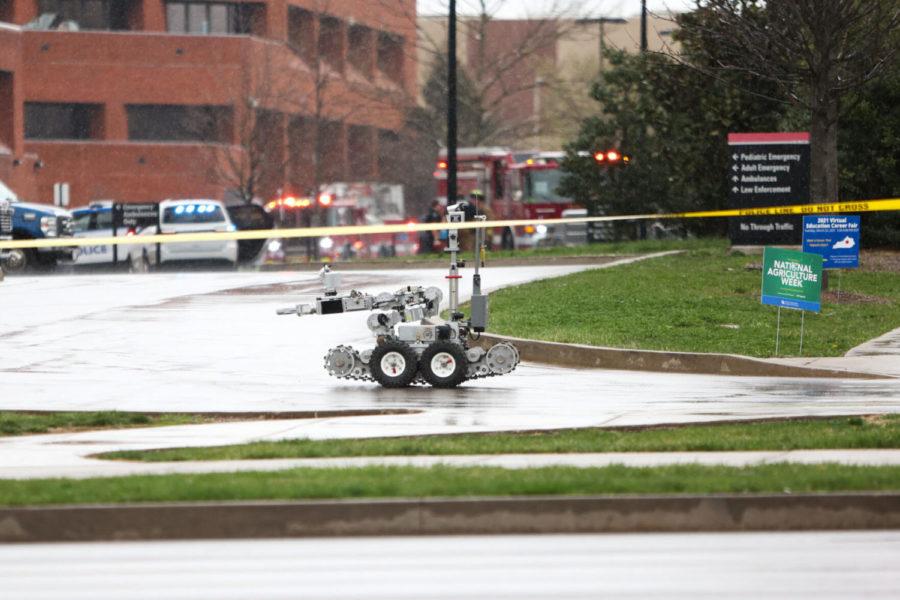 A bomb disposal robot is guided to the entrance of UK Chandler Hospital at 10:30 a.m. as part of law enforcement’s response to a situation with a suspicious package in the hospital’s emergency room the morning of March 25, 2021.