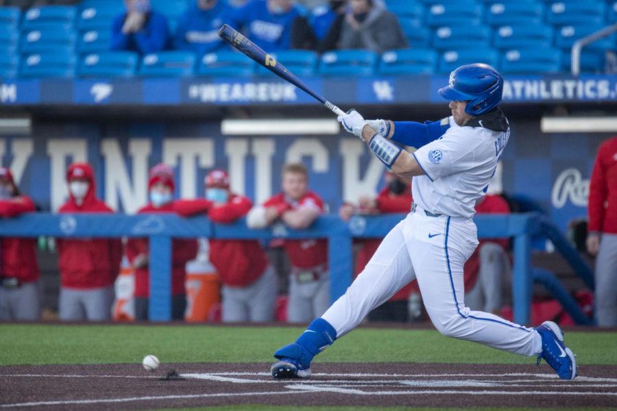 Kentucky Wildcat T.J. Collett (5) hits the ball during the University of Kentucky vs. Miami Ohio game on Tuesday, Feb. 23, 2021, at Kentucky Proud Park in Lexington, Kentucky. UK won 5-1. Photo by Jack Weaver | Staff