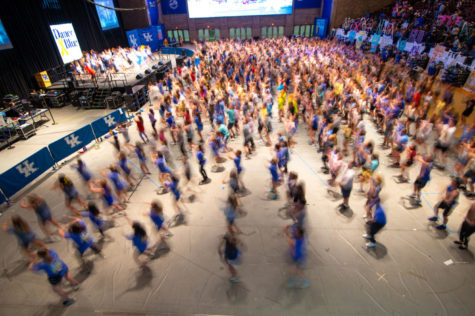Students participate in a line dance during the 24 hour DanceBlue marathon at 3:06 a.m. on Sunday, March 1, 2020, at Memorial Coliseum in Lexington, Kentucky. Photo by Jordan Prather | Staff