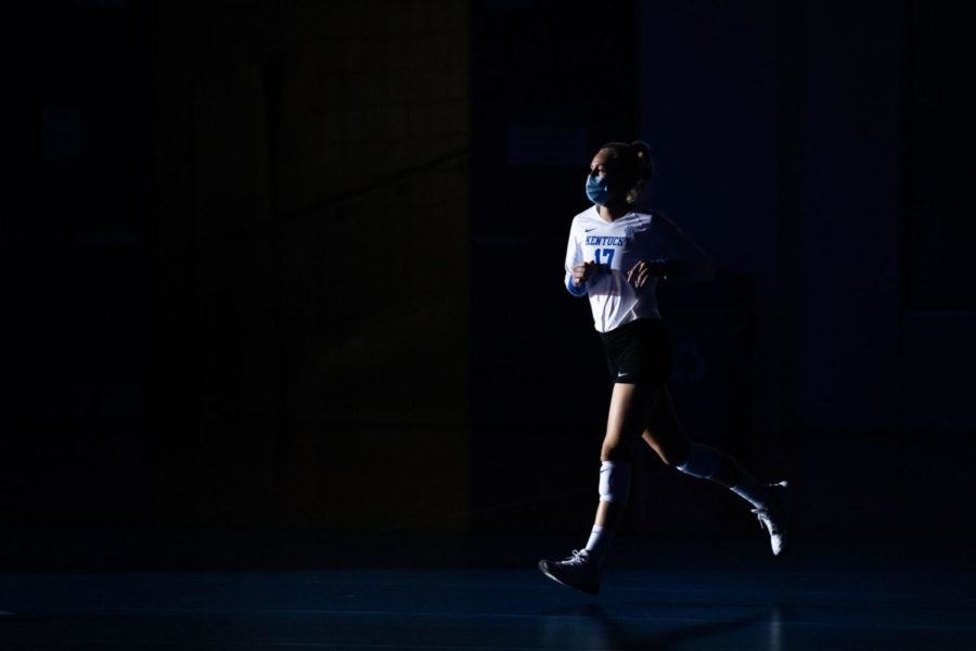 Kentucky Wildcats outside hitter Alli Stumler (17) runs onto the court during introductions before the UK vs. Ole Miss volleyball game on Friday, March 12, 2021, at Memorial Coliseum in Lexington, Kentucky. UK won 3-0. Photo by Michael Clubb | Staff