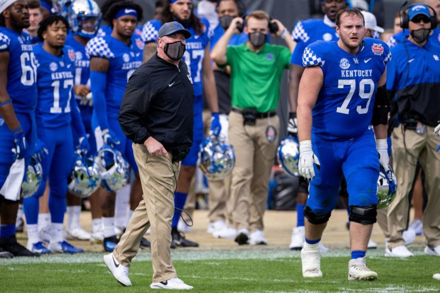 Kentucky Wildcats head coach Mark Stoops yells at a player for getting a sportsman like conduct call during the University of Kentucky vs. North Carolina State TaxSlayer Gator Bowl game on Saturday, Jan. 2, 2021, at TIAA Bank Field in Jacksonville, Florida. Kentucky won 23-21. Photo by Michael Clubb | Staff