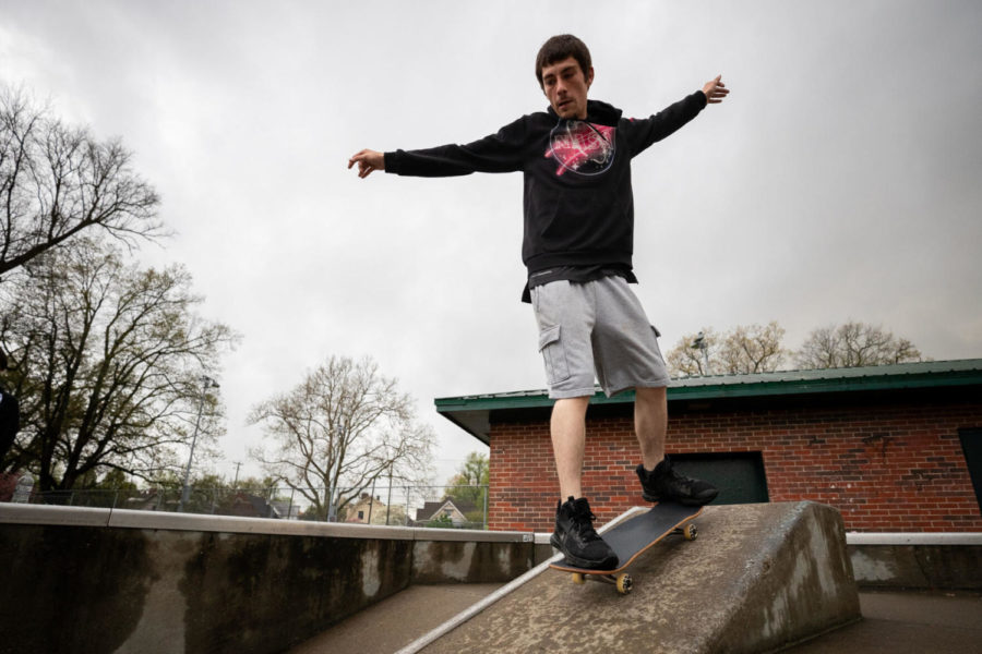 Skylar, 21, rides his skateboard down a ramp on Saturday, April 10, 2021, at Woodland Park in Lexington, Kentucky. Photo by Michael Clubb | Staff