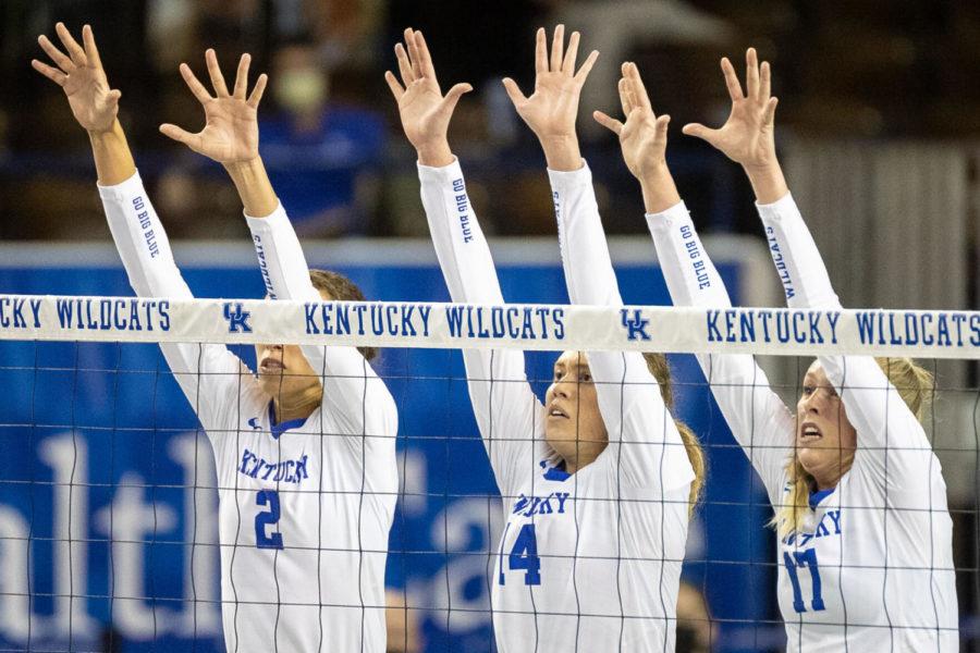 UK attempts to block a kill during the University of Kentucky vs. University of Alabama volleyball game on Wednesday, March 24, 2021, at Memorial Coliseum in Lexington, Kentucky. UK won 3-0. Photo by Michael Clubb | Staff