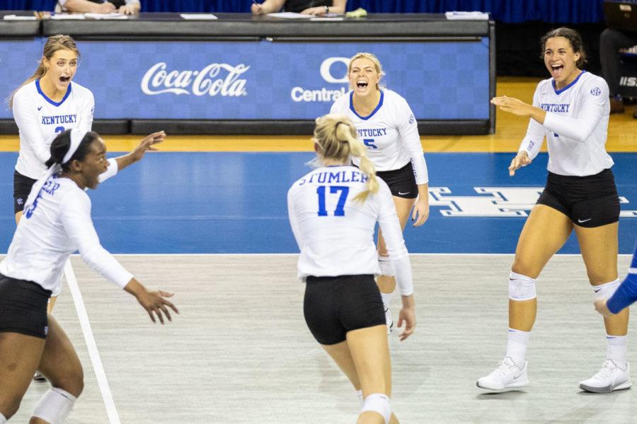 UK celebrates a point during the University of Kentucky vs. University of Alabama volleyball game on Wednesday, March 24, 2021, at Memorial Coliseum in Lexington, Kentucky. UK won 3-0. Photo by Michael Clubb | Staff