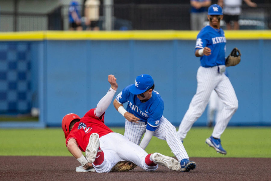 Kentucky Wildcat Drew Grace (7) attempts to tag a runner during the UK vs. Louisville baseball game on Tuesday, April 20, 2021, at Kentucky Proud Park in Lexington, Kentucky. UK lost 12-5. Photo by Jack Weaver | Staff