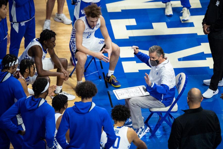 Kentucky Wildcats head coach John Calipari coaches his players in a huddle before the University of Kentucky vs. University of Richmond men's basketball game on Sunday, Nov. 29, 2020, at Rupp Arena in Lexington, Kentucky. Richmond won 76-64. Photo by Michael Clubb | Staff