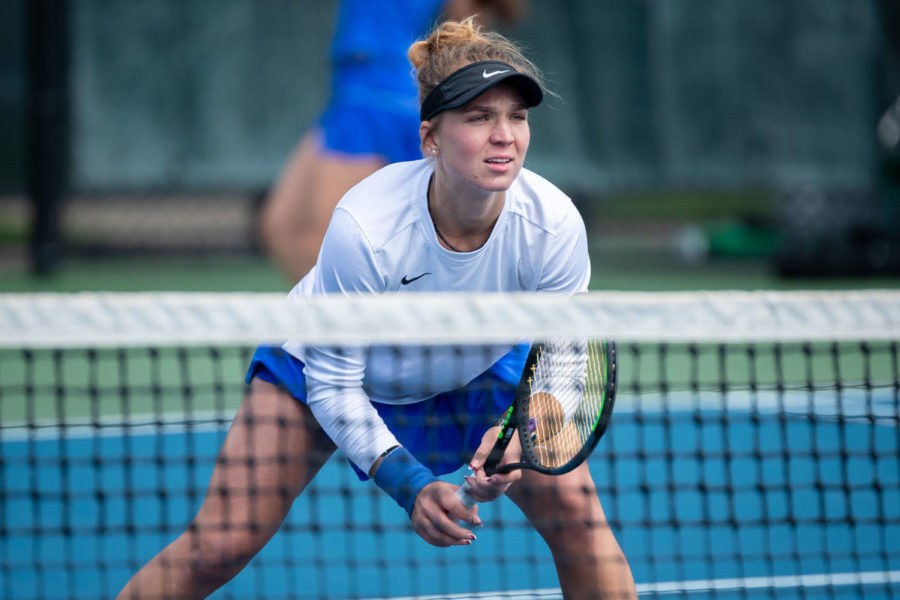 Akvilė Paražinskaitė gets ready for her teammate to serve during the University of Kentucky vs. Tennessee women’s tennis match on Sunday, March 28, 2021, at Hillary J. Boone Tennis Center in Lexington, Kentucky. Photo by Michael Clubb | Staff