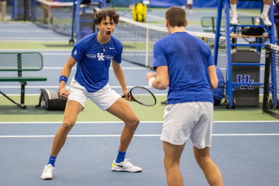 Gabriel Diallo celebrates with his doubles partner during the University of Kentucky vs. Louisiana State mens tennis meet on Sunday, Feb. 21, 2021, at the Hilary J. Boone Tennis Complex in Lexington, Kentucky. Kentucky won 4-0. Photo by Jack Weaver | Staff