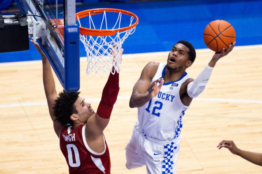 Kentucky Wildcats forward Keion Brooks Jr. (12) lays the ball up during the University of Kentucky vs. Arkansas mens basketball game on Tuesday, Feb. 9, 2021, at Rupp Arena in Lexington, Kentucky. UK lost 81-80. Photo by Michael Clubb | Staff