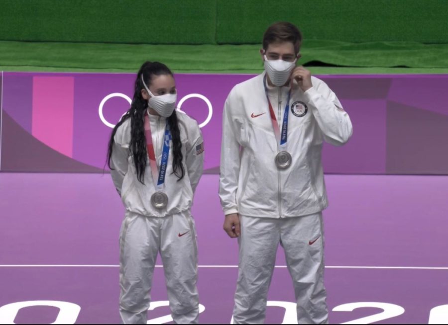 Mary Tucker and Lucas Kozeniesky pose with their Olympic silver medals after the 10m Air Rifle Mixed Team Gold Medal match between Team USA and China on Tuesday July 27, 2021. 