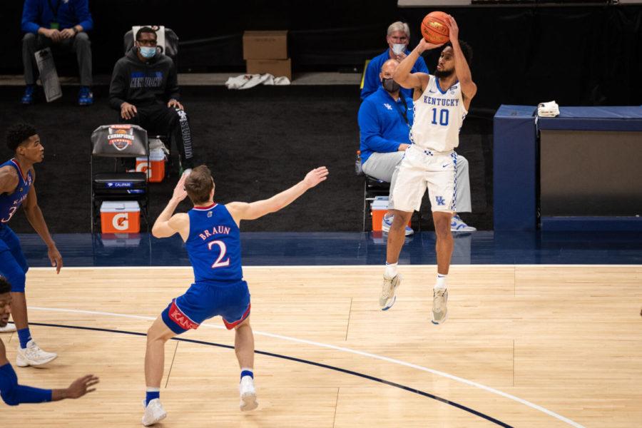 Kentucky Wildcats guard Davion Mintz (10) shoots a three during the University of Kentucky vs. University of Kansas mens basketball game at the Champions Classic on Tuesday, Dec. 1, 2020, at Bankers Life Fieldhouse in Indianapolis, Indiana. Kansas won 65-62. Photo by Michael Clubb | Staff