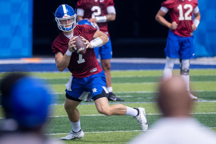 Will Levis (7) runs the ball during a teams drill during the UK football Fan Day open practice on Saturday, Aug. 7, 2021, at Kroger Field in Lexington, Kentucky. Photo by Michael Clubb | Staff
