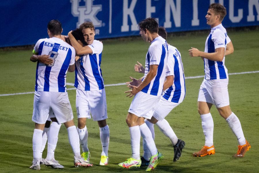 Kentucky players celebrate Daniel Evanss (7) opening goal during the Kentucky vs. Wright State mens soccer game on Monday, Aug. 30, 2021, at the Bell Soccer Complex in Lexington, Kentucky. UK won 3-0. Photo by Michael Clubb | Staff