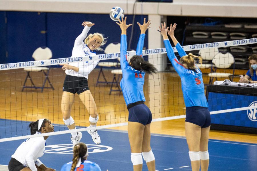 Kentucky Wildcats outside hitter Alli Stumler (17) hits the ball over the net during the UK vs. Ole Miss game on Saturday, March 13, 2021, at Memorial Coliseum in Lexington, Kentucky. UK won 3-1. Photo by Jack Weaver | Staff