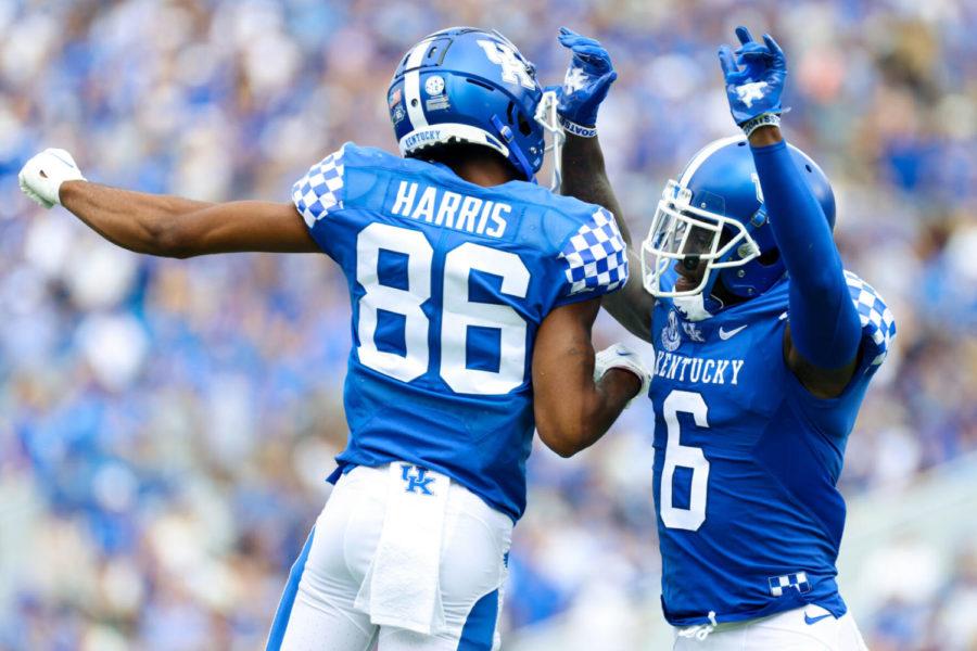 Kentucky wide receiver Josh Ali (6) and wide receiver DeMarcus Harris (86) celebrate after scoring a touchdown during the first half of a NCAA college football game against Chattanooga in Lexington, Ky., Saturday, Sept. 18, 2021. (AP Photo/Michael Clubb)