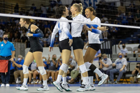 Kentucky Wildcats outside hitter Alli Stumler (17) celebrates with Kentucky Wildcats setter Emma Grome (4) during UK’s home opener against Northern Iowa on Friday, Sept. 3, 2021, at Memorial Coliseum in Lexington, Kentucky. UK won 3-0. Photo by Jack Weaver | Staff