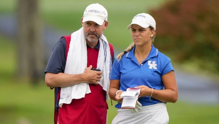 Jensen+Castle+and+her+caddie%2C+Tom+Moylan%2C+discussed+strategy+Sunday+during+the+championship+match+of+the+U.S.+Women%E2%80%99s+Amateur.+Castle+became+the+first+University+of+Kentucky+golfer+to+win+the+event.+Darren+Carroll+%7C%C2%A0USGA