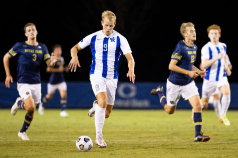 Kentucky Wildcats forward Eythor Bjorgolfsson (9) pushes the ball upfield during the University of Kentucky vs. Notre Dame mens soccer game on Friday, Sept. 3, 2021, at the Bell Soccer Complex in Lexington, Kentucky. UK won 1-0. Photo by Michael Clubb | Staff