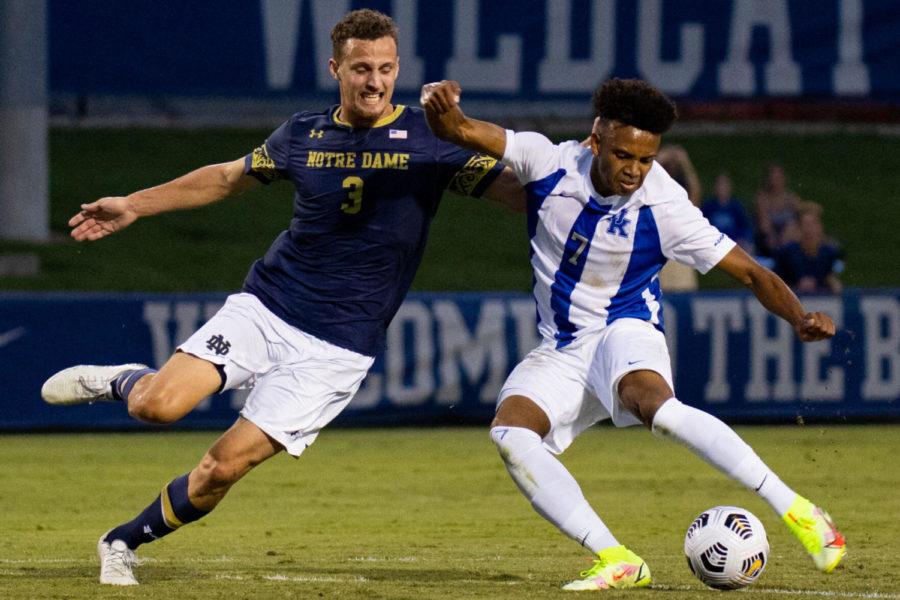 Kentucky Wildcats forward Daniel Evans (7) kicks the ball away from a defender during the University of Kentucky vs. Notre Dame mens soccer game on Friday, Sept. 3, 2021, at the Bell Soccer Complex in Lexington, Kentucky. UK won 1-0. Photo by Michael Clubb | Staff