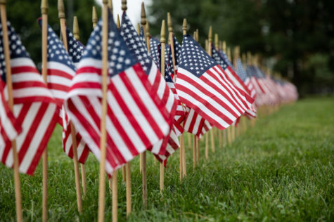 Flags form the outline “9/11” on Friday, Sept. 11, 2020, outside of the Main Building in Lexington, Kentucky. Photo by Jack Weaver | Staff