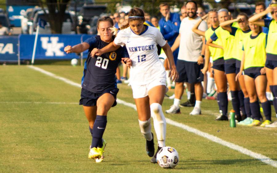 Kentucky Wildcats midfielder Gretchen Mills (12) defends the ball during UK’s game against Murray State on Sunday, Sept. 12, 2021, at Wendell and Vickie Bell Soccer Complex in Lexington, Kentucky. UK won 3-2. Photo by Jackson Dunavant | Staff