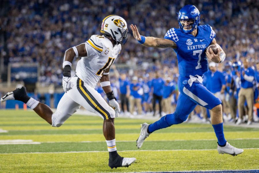 Kentucky quarterback Will Levis (7) stiff arms a defender to score a touchdown during UK’s game against Missouri on Saturday, Sept. 11, 2021, at Kroger Field in Lexington, Kentucky. UK won 35-28. Photo by Jack Weaver | Staff