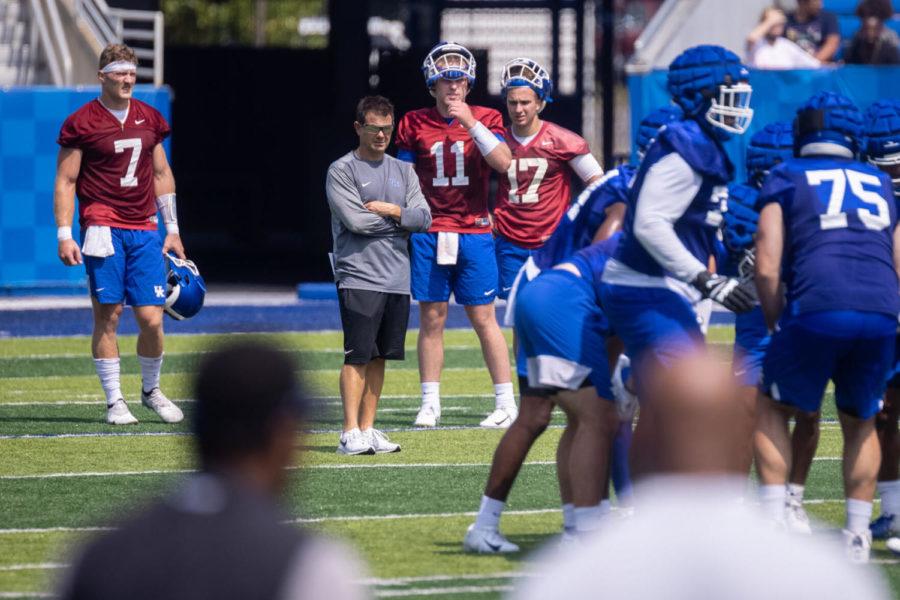 Kentucky’s quarterbacks watch a teams drill during the UK football Fan Day open practice on Saturday, Aug. 7, 2021, at Kroger Field in Lexington, Kentucky. Photo by Michael Clubb | Staff