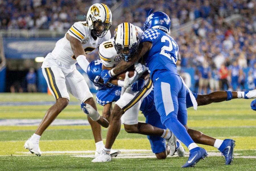 Kentucky defensive back Tyrell Ajian (23) makes a tackle during UK’s game against Missouri on Saturday, Sept. 11, 2021, at Kroger Field in Lexington, Kentucky. UK won 35-28. Photo by Jack Weaver | Staff