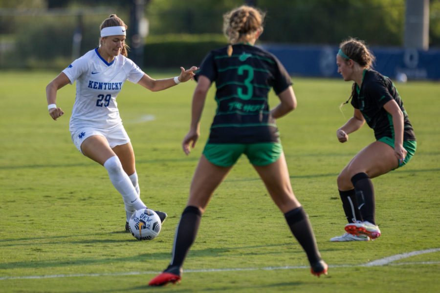Kentucky Wildcats forward Emily Hähnel (29) dribbles past defenders during UK’s game against Marshall on Sunday, Aug. 22, 2021, at Wendell and Vickie Bell Soccer Complex in Lexington, Kentucky. UK won 3-0. Photo by Jack Weaver