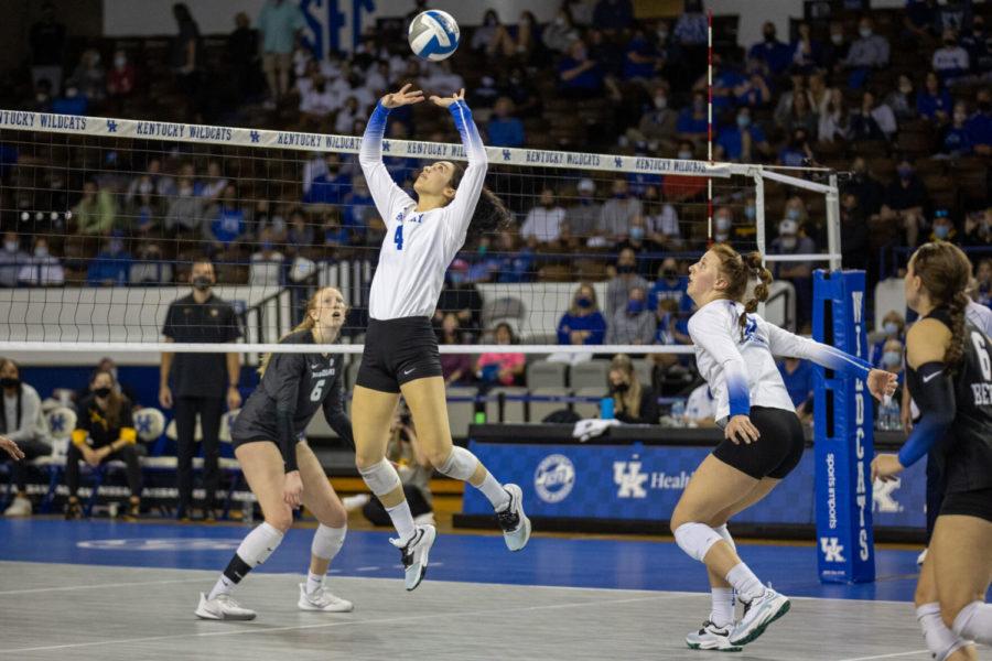 Kentucky Wildcats setter Emma Grome (4) sets the ball during the University of Kentucky vs. Missouri volleyball game on Friday, Sept. 24, 2021, at Memorial Coliseum in Lexington, Kentucky. UK won 3-0. Photo by Jack Weaver | Staff