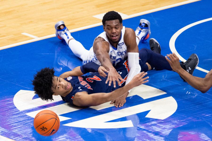 Kentucky Wildcats forward Keion Brooks Jr. (12) dives for a loose ball during the University of Kentucky vs. Auburn mens basketball game on Saturday, Feb. 13, 2021, at Rupp Arena in Lexington, Kentucky. UK won 82-80. Photo by Michael Clubb | Staff