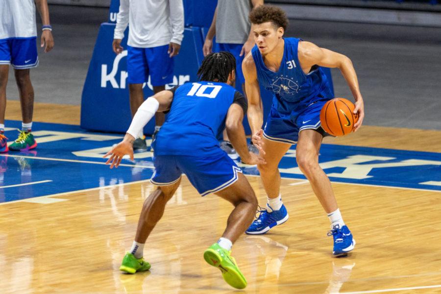 Kentucky guard Kellan Grady (31) dribbles the ball during a practice on Monday, Oct. 11, 2021, at Rupp Arena in Lexington, Kentucky. Photo by Jack Weaver | Staff