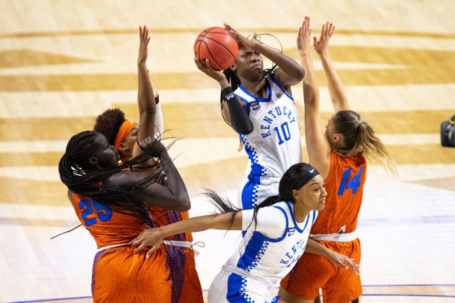 Kentucky Wildcats guard Rhyne Howard (10) puts the ball up during the UK vs. Florida women’s SEC Tournament basketball game on Thursday, March 4, 2021, at Bon Secours Wellness Arena in Greenville, South Carolina. UK won 73-63. Photo by Michael Clubb | Staff