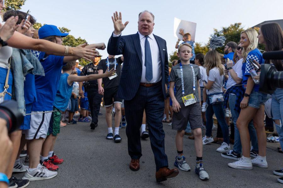 Kentucky head coach Mark Stoops waves to fans during the Cat Walk before the No. 16 University of Kentucky vs. LSU game on Saturday, Oct. 9, 2021, at Kroger Field in Lexington, Kentucky. Photo by Jack Weaver | Staff