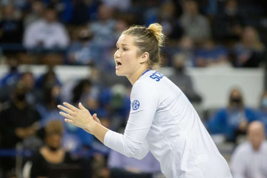 Kentucky Wildcats setter Cameron Scheitzach (8) cheers after the wildcats get a point during the UK vs. Texas A&M volleyball game on Saturday, Nov. 13, 2021, at Memorial Coliseum in Lexington, Kentucky. UK won 3-0. Photo by Amanda Braman | Staff