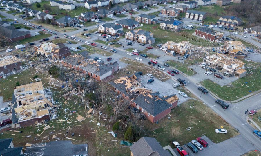 Debris+from+damaged+homes+is+scattered+throughout+a+neighborhood+following+a+tornado+on+Saturday%2C+Dec.+11%2C+2021%2C+on+Creekwood+Avenue+in+Bowling+Green%2C+Kentucky.%C2%A0Photo+by+Jack+Weaver+%7C+Staff