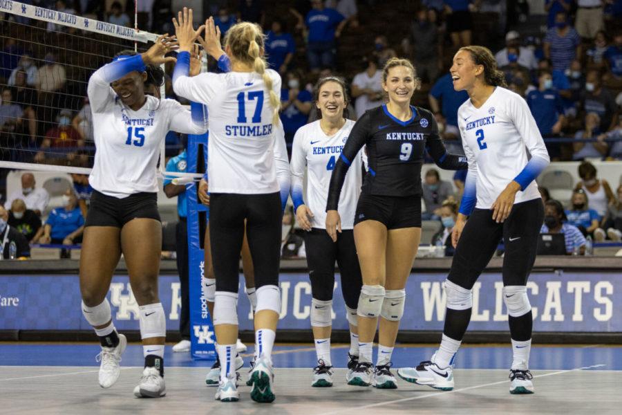 The Wildcats celebrate during UK volleyball’s game against Southern California on Saturday, Sept. 4, 2021, at Memorial Coliseum in Lexington, Kentucky. UK won 3-0. Photo by Jack Weaver | Staff