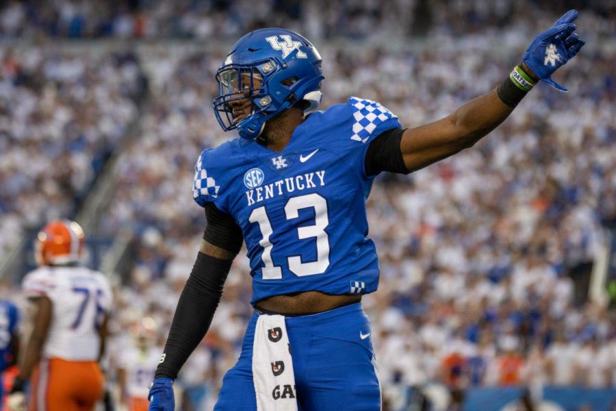 Kentucky linebacker J.J. Weaver (13) celebrates after a flag is throw against Florida during the University of Kentucky vs. Florida football game on Saturday, Oct. 2, 2021, at Kroger Field in Lexington, Kentucky. UK won 20-13. Photo by Jack Weaver | Staff