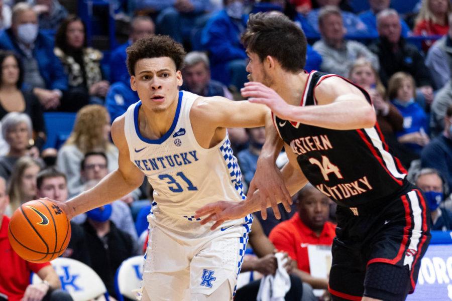 Kentucky Wildcats guard Kellan Grady (31) drives the ball into the paint during the UK vs Western Kentucky basketball game on Wednesday, Dec. 22, 2021, at Rupp Arena in Lexington, Kentucky. UK won 95-60. Photo by Michael Clubb | Staff